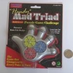 Mad Triad Handy